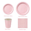 A set of pink scalloped paper tableware including 7 inch and 9 inch plates, cups, and napkins.