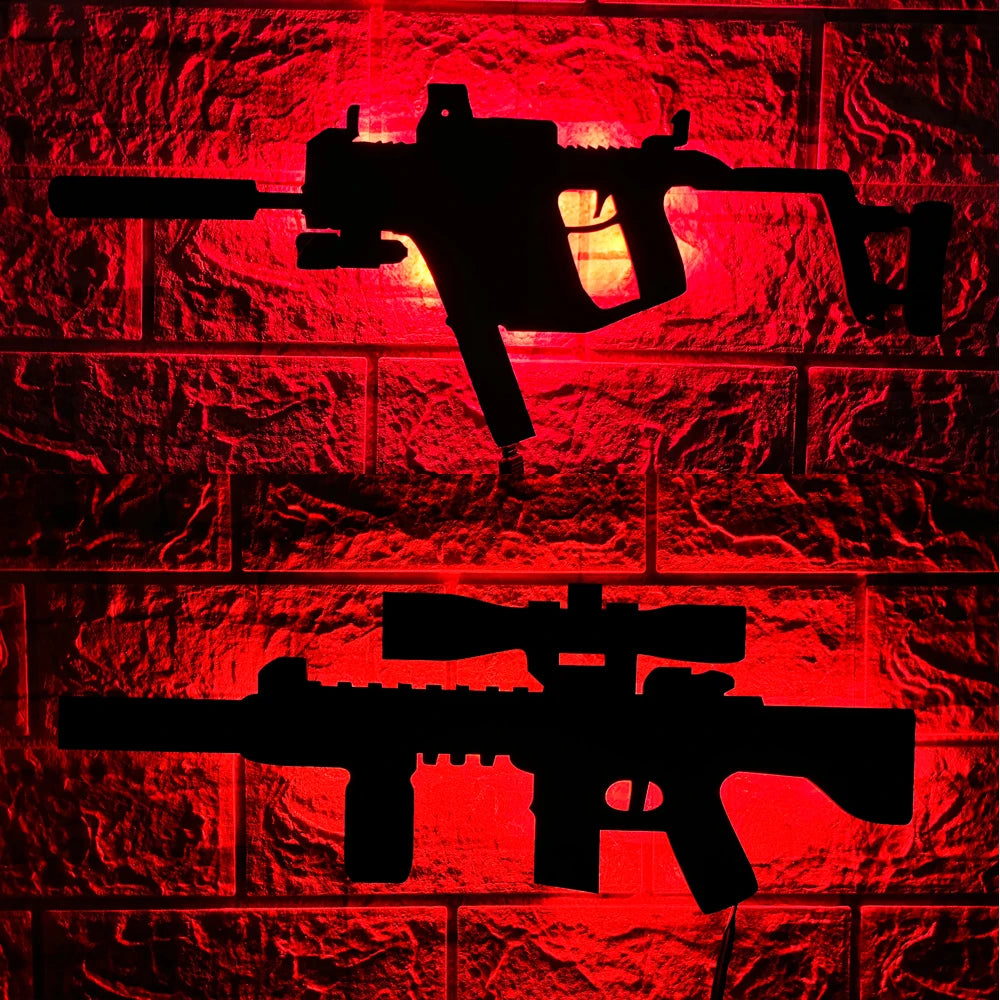 A red silhouette of a gun-shaped light fixture mounted on a brick wall.
