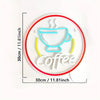 A white silicone coffee cup design with steam lines and the word Coffee printed on a circular background.