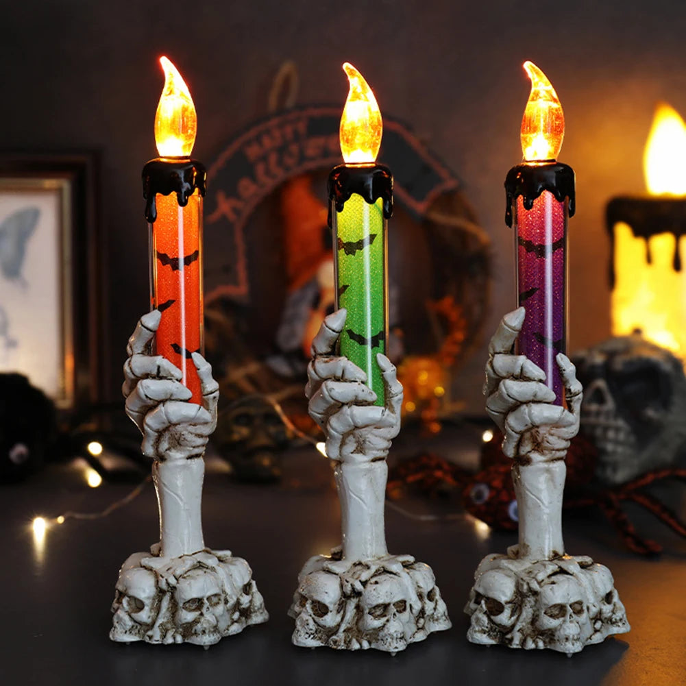 Drei gruselige Geisterhändekandel LED in Orange, Grün und Lila für Halloween-Dekoration