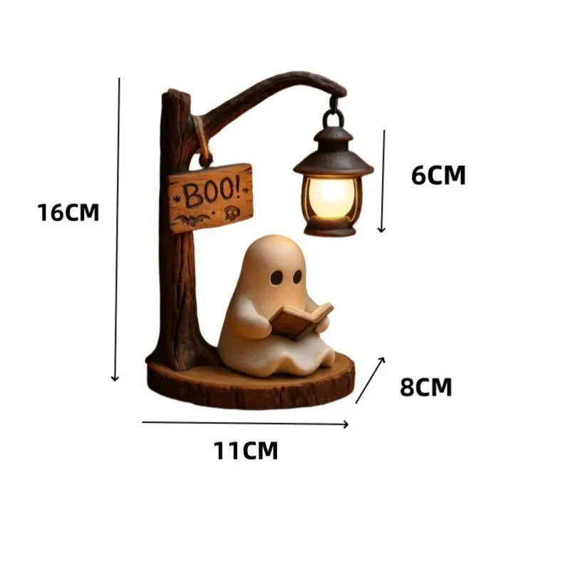 A wooden ghost reading figurine with a hanging lantern decor.