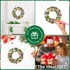 DIY diamond painting wreath kit showing a finished wreath and a person painting it for Christmas decor