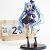 Gothic Lolita Miku action fairy doll with light blue hair and purple outfit displayed on a wooden board.