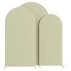 A set of three light sage green arch stands or backdrops for wedding and event decor.