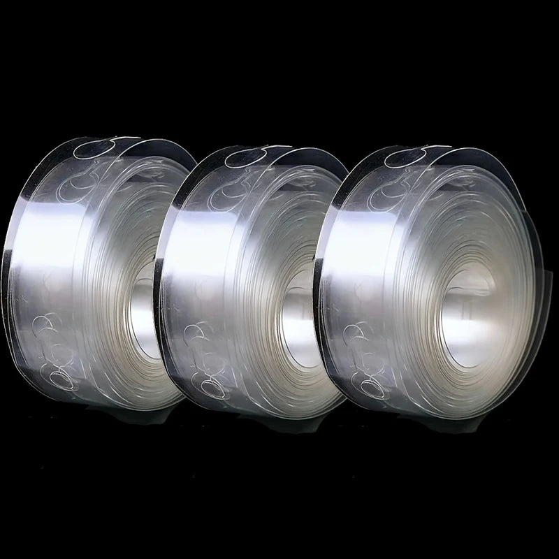 Three rolls of clear plastic material for a balloon garland