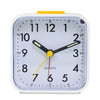 A white digital alarm clock face showing the time, with a yellow top and black hands.