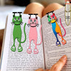 A set of decorative acrylic cat bookmarks featuring various feline characters and text.