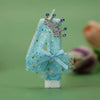 A light blue digital birthday candle decorated with a silver crown and sheer netting.