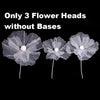 Three large white velvet mesh flower heads without bases for wedding decoration.