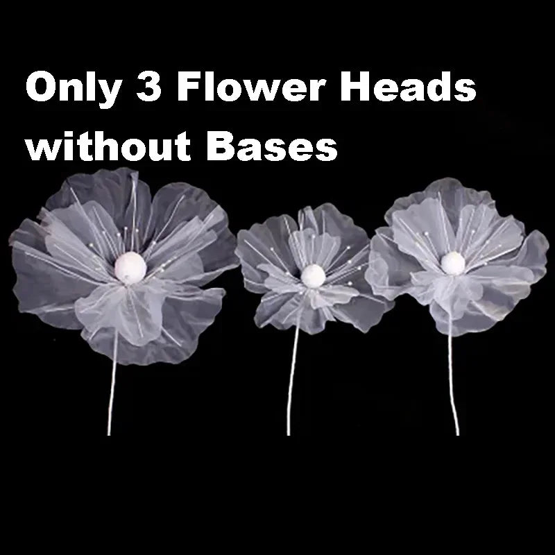 Three large white velvet mesh flower heads without bases for wedding decoration.