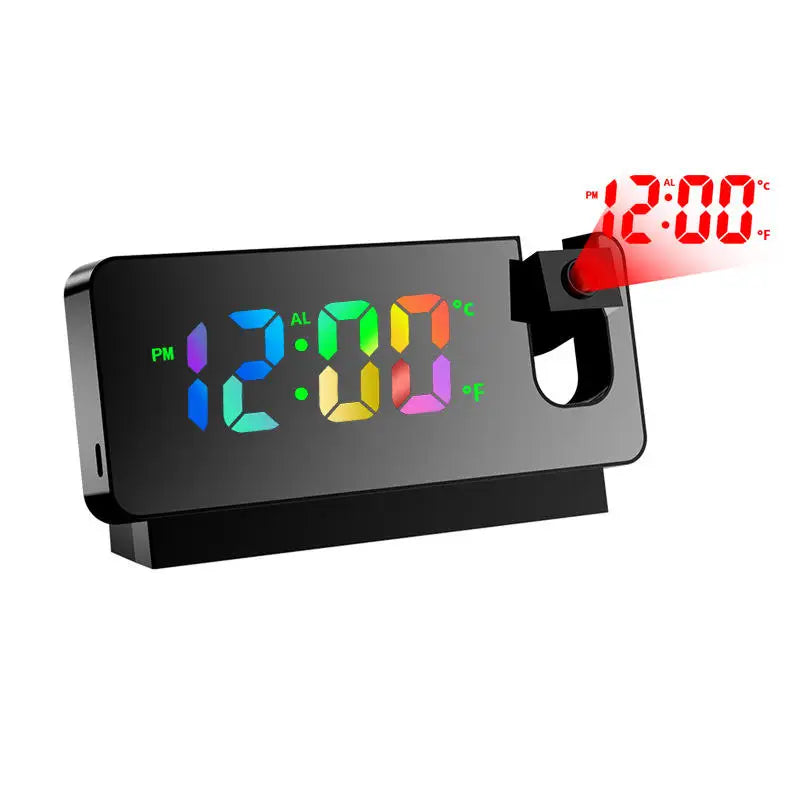 A black projection alarm clock displaying 12:00 and temperature, with a red light beam projecting the time.