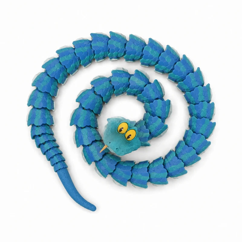 A blue articulated snake desk toy made of flexible, textured material coiled in a spiral.