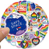 A colorful collage of safe space themed graffiti stickers featuring rainbows, stars, and various symbols.