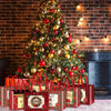 A festive display of Christmas gift bags in red and green plaid patterns arranged in front of a decorated Christmas tree.