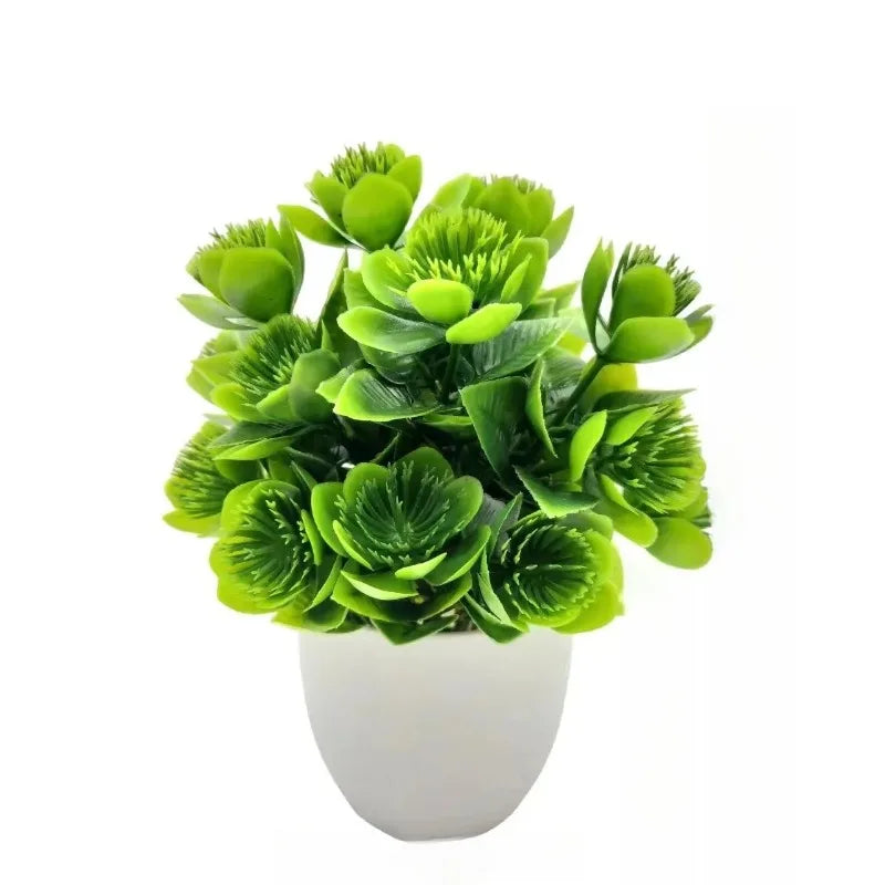Lebendiges grünes Kunstbonsai-Pflanze in weißem Topf für Home-Dekoration.
