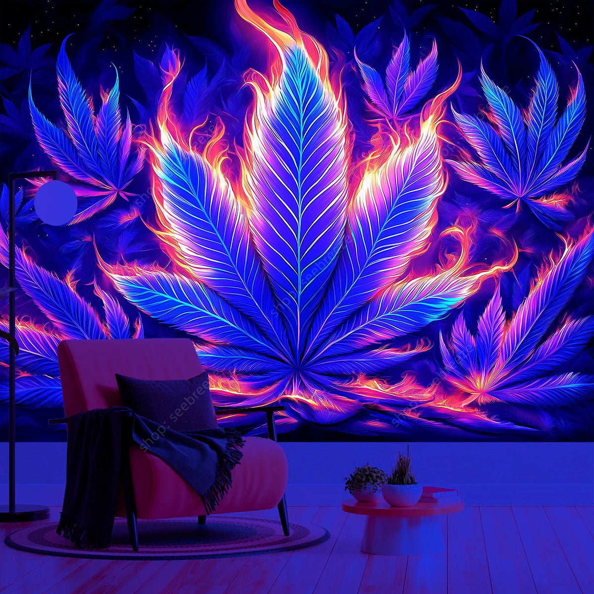 A vibrant neon cannabis leaf tapestry hangs on a wall above a pink armchair.