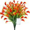 A vibrant bouquet of artificial orange and red calla lilies for home decor.