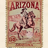 A vintage postage stamp featuring a woman on a horse against a desert landscape, labeled Arizona.