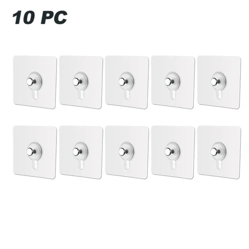 Ten white adhesive wall hooks with silver-colored mounting hardware.