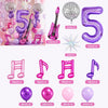 Purple music theme birthday party decorations including balloons, letters, and props