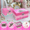 Pink unicorn jewelry box featuring a rotating dancer mechanism and storage space.