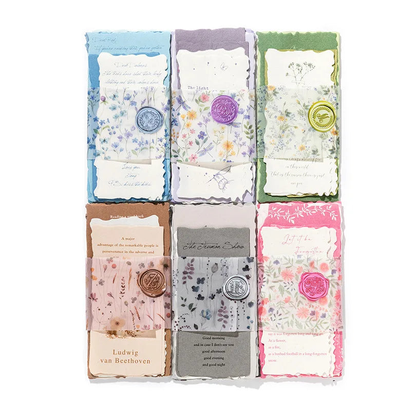 A set of vintage old English manuscript decor paper sheets in various pastel and muted tones.
