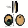 Black framed wall art featuring a silhouette of a cat on a gold background
