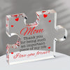 A clear acrylic block puzzle engraved with 'Mom Thank you for being such an important piece of my life I love you forever'