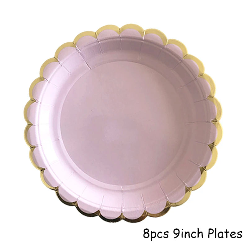 A stack of 8 pink plates with gold trim, labeled as 9 inch plates.