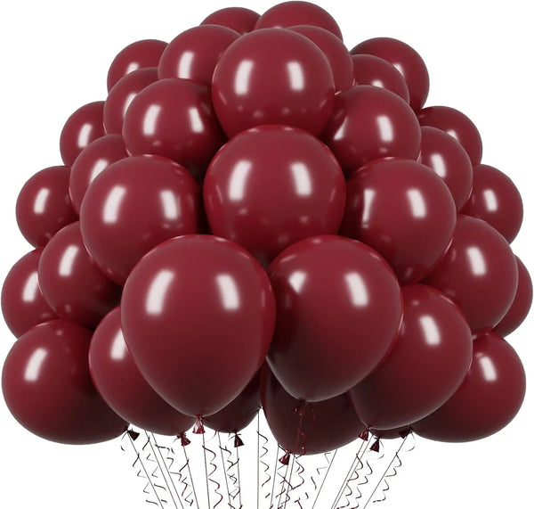 A cluster of burgundy red latex balloons tied together, ready for a wedding or celebration.