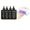A set of UV resin bottles and a pink UV curing lamp for jewelry making