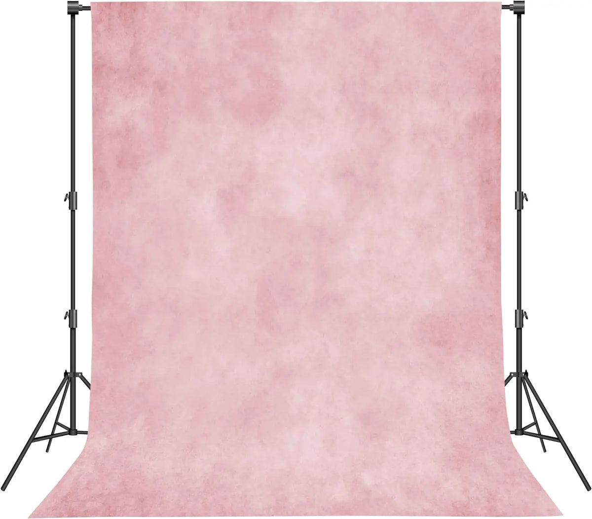 A vertical pink rustic barn door backdrop for photography, mounted on a stand.