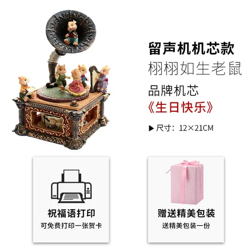 A decorative music box featuring a figurine on top, with text indicating it is a retro carousel music box decoration.
