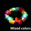 A circular flower crown headband made of LED lights displaying mixed colors like red, orange, yellow, green, and blue.