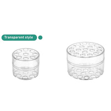 A clear glass spiral stem holder for DIY floral arrangements shown in two pieces.