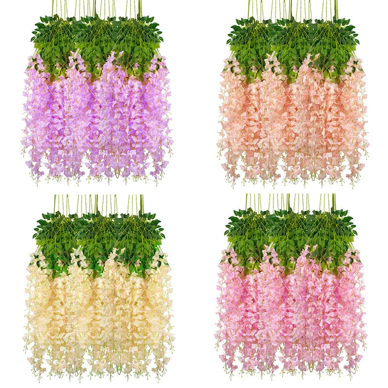 Three silk wisteria vine garlands in shades of purple, peach, and pink hanging for weddings and home decor