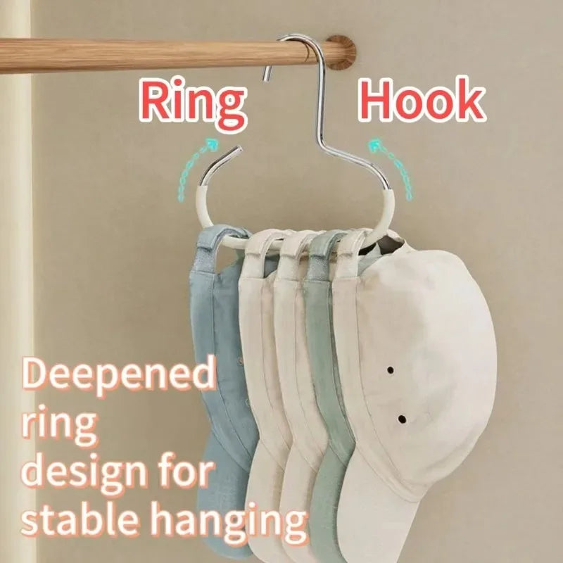 A rack of eight light-colored hats hanging from a ring hook on a wooden rod.