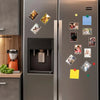 Magnetic mini photo frames displayed on a refrigerator door with various pictures and colored sticky notes