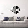 Black and white sound wave graphic featuring a vinyl record on a white wall for kids room decor