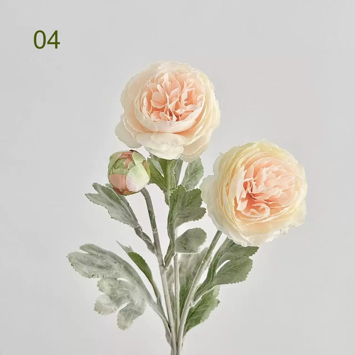 A delicate arrangement of pale peach and cream silk peonies on a green stem.