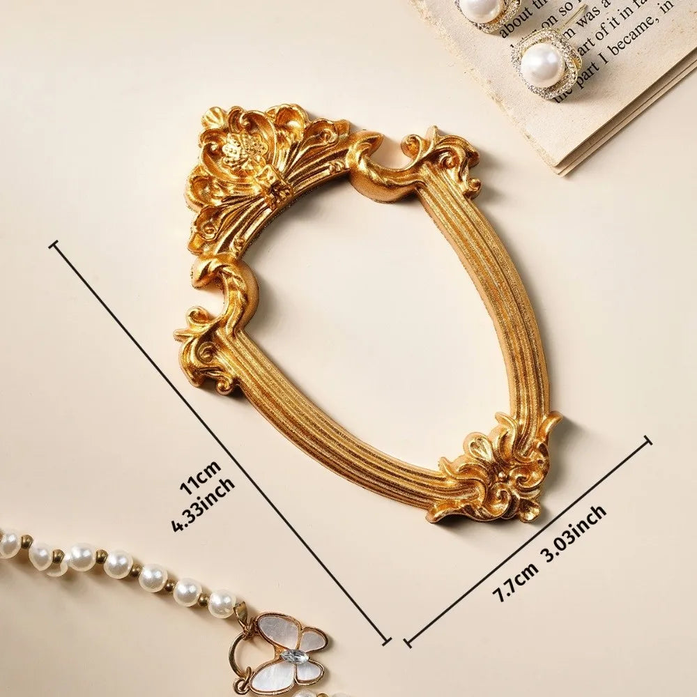 Vintage gold DIY shadow box frame for a 3D memory display with a pearl beaded chain and a flower charm
