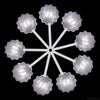 Eine Ansammlung klarer, sphärischer Einweg-Konfitüre-Pipetten, radial auf schwarzem Hintergrund angeordnet.