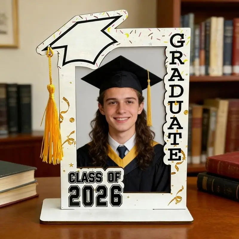 A white photo frame decorated with a graduation cap and gown, featuring the text Graduate and Class of 2026.