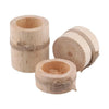 A set of rustic wooden stump candle holders, showing various sizes and textures.