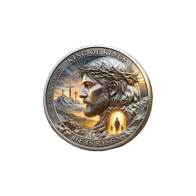 A commemorative coin featuring Jesus Christ with a crown of thorns, inscribed with 'King of Kings' and 'He Is Risen'.