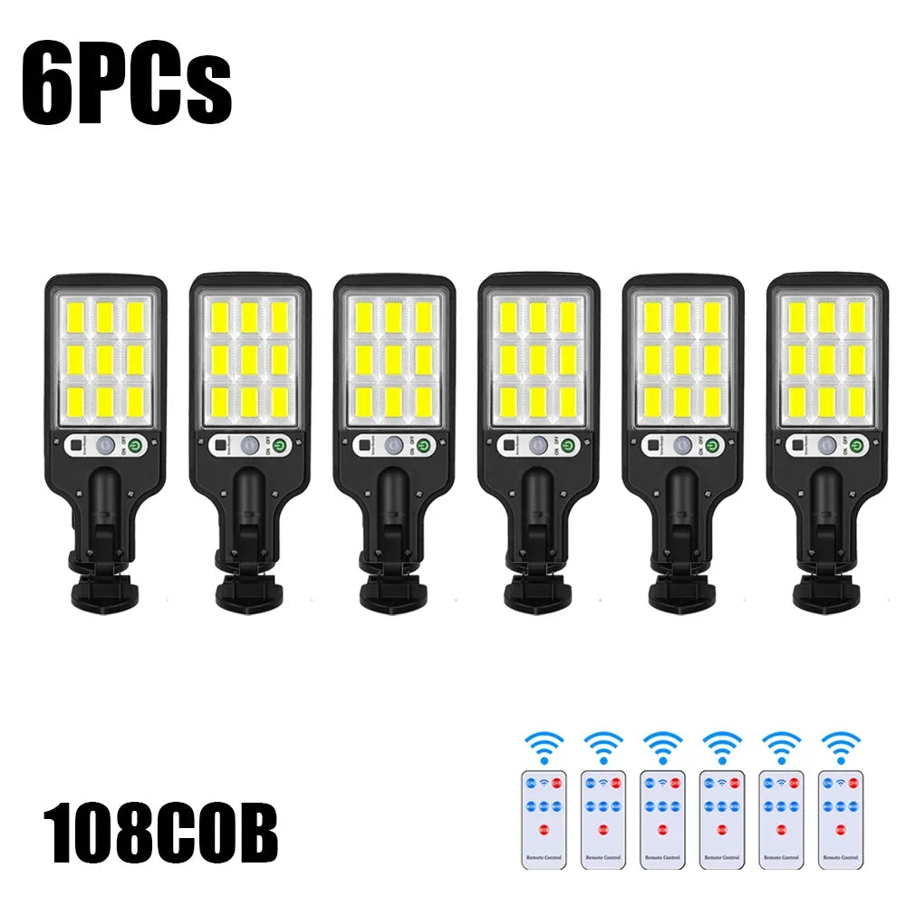 Six packs of solar powered motion sensor security lights with 108 LED bulbs