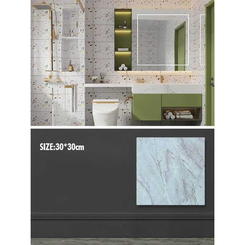 A modern bathroom vanity featuring marble wall decals, green cabinetry, and a mirror.