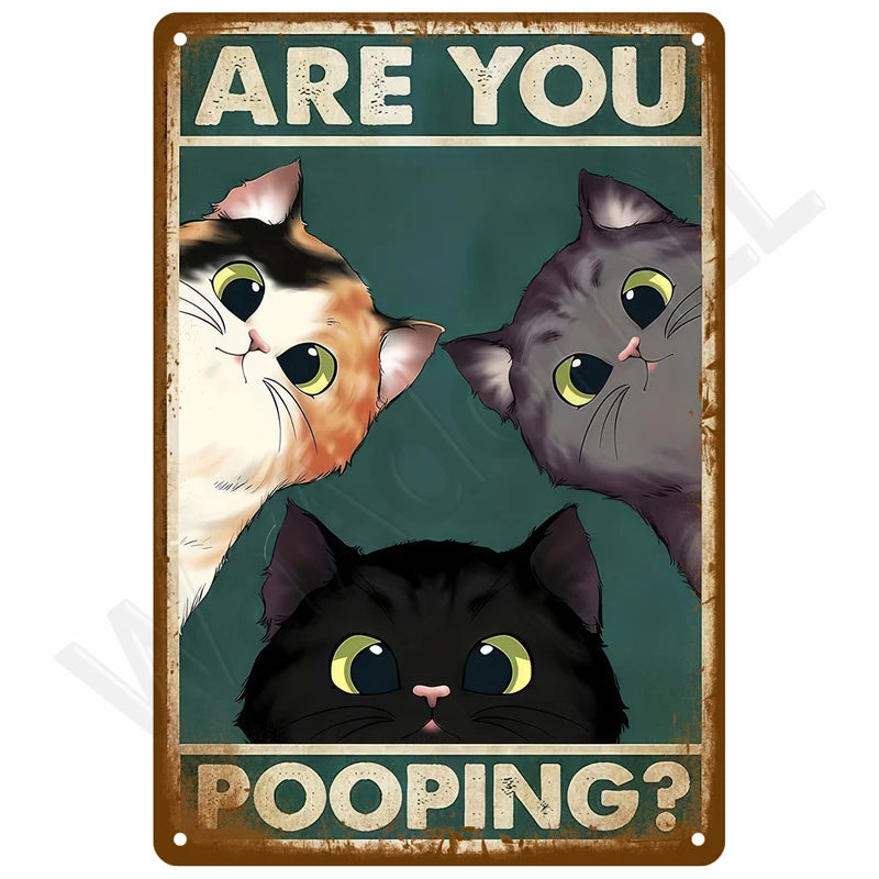 A vintage metal wall sign featuring three cats asking Are You Pooping?