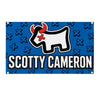 A blue banner featuring a white bull silhouette and the name SCOTTY CAMERON in black text.