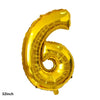 A shiny gold foil balloon shaped like the number six